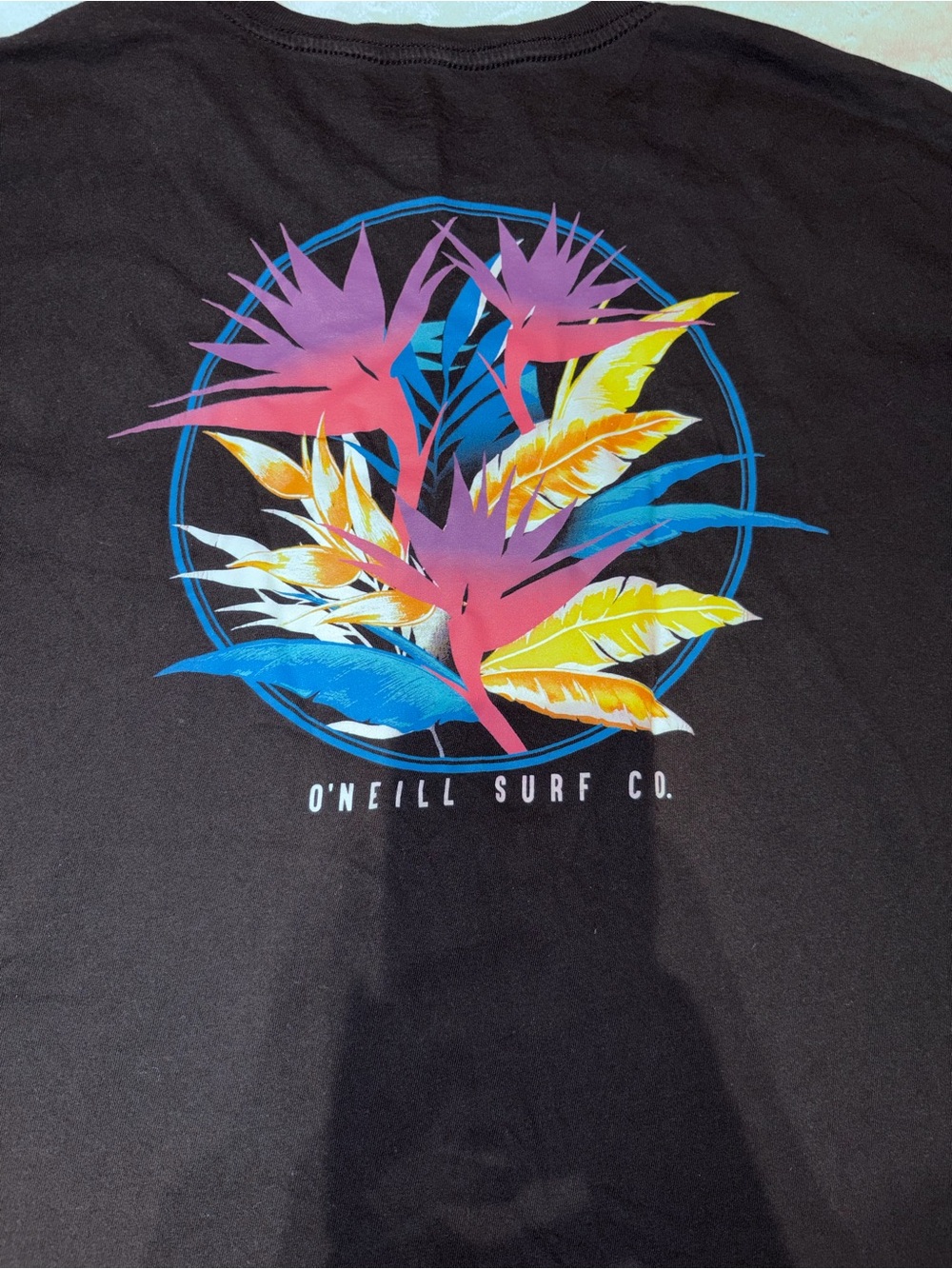 O'Neill Black Tee with Neon Tropical Floral Circle Graphic